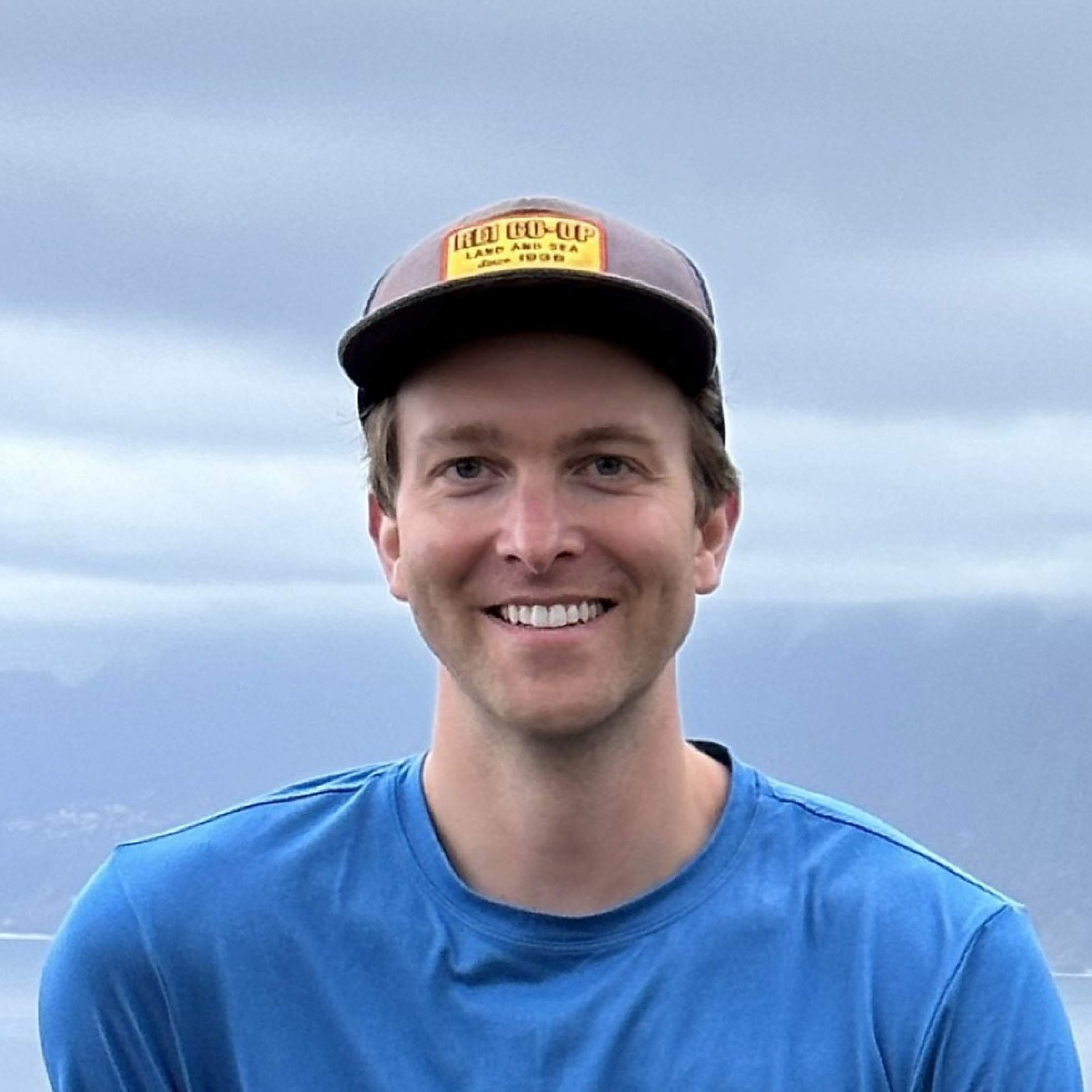 Head shot of Adam Strand, MD